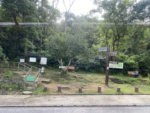 MacLehose Trail junction signpost at Pak Tam Au, where the trail starts
